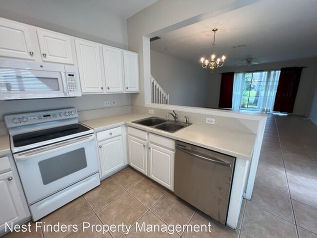 Building Photo - 3 br, 2.5 bath House - 7499 Scarlet Ibis Lane