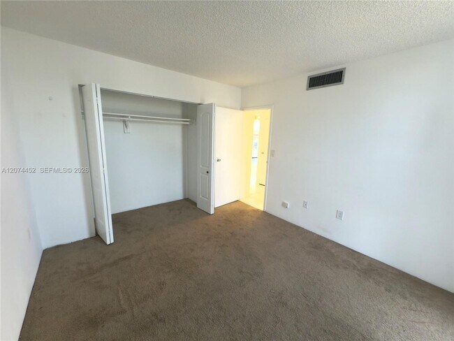 Building Photo - 3675 N Country Club Dr