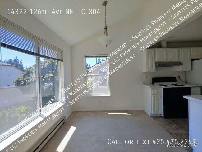 Building Photo - Top Floor 2 Bedroom Condo- with Vaulted Ce...