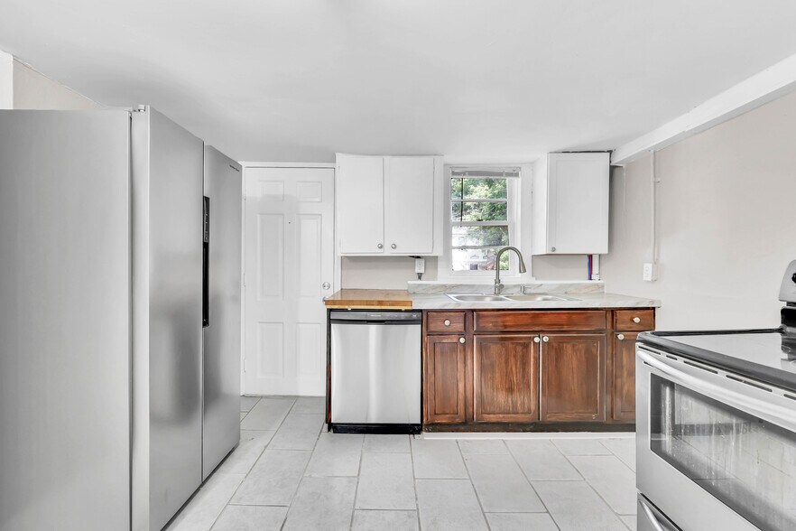 All-new kitchen with stainless steel appliances. - 1 Proctor Dr