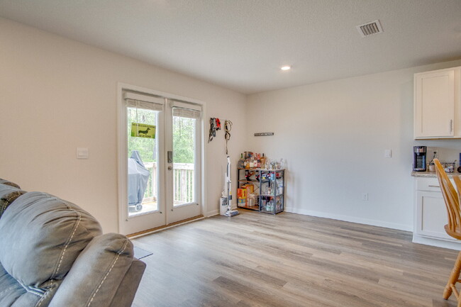 Building Photo - Spacious 4BR Home with 2-Car Garage Near M...