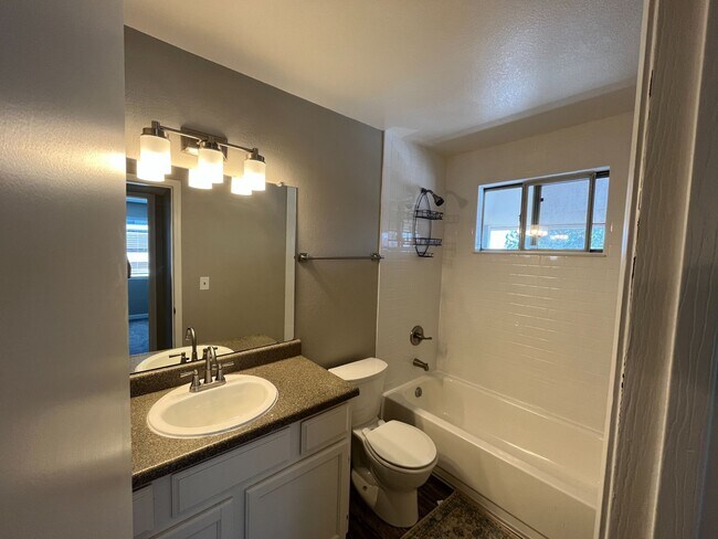 Building Photo - GORGEOUSLY REMODELED 2 bed 2 bath on 3rd floor with vaulted ceiling and skylight and in unit W/D!!