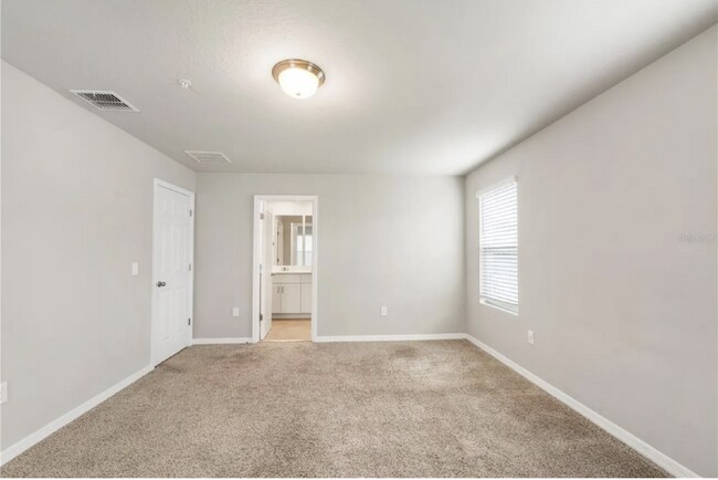 Building Photo - Charming 3-Bed Oasis in Ocoee: Spacious 1574 sq. ft. Townhouse with 2.5 Baths!
