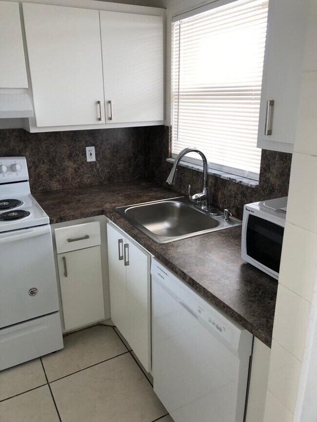 Building Photo - 8110 Sunrise Lakes Blvd