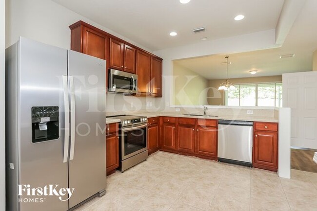 Building Photo - 6947 Roundleaf Dr