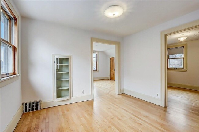 Dinning Room with unique glass display cabinet - 322 E Rosedale Ave