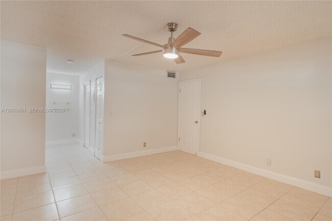 Building Photo - 2700 Coral Springs Dr