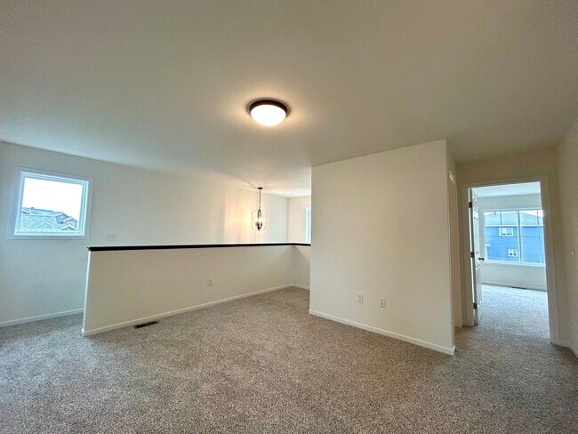 Building Photo - Spacious & Stylish 3-Bed Home with Modern Finishes and Attached 2-Stall Garage