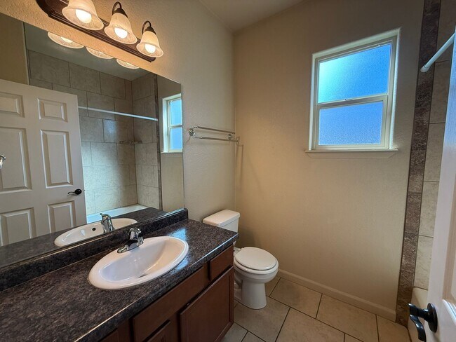 Building Photo - Beautiful 4 bedroom, 2 bath, 3 car garage ...