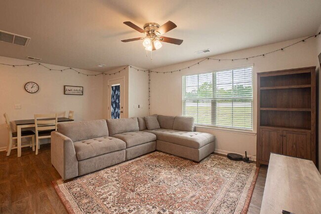 Building Photo - Partially furnished and now available!