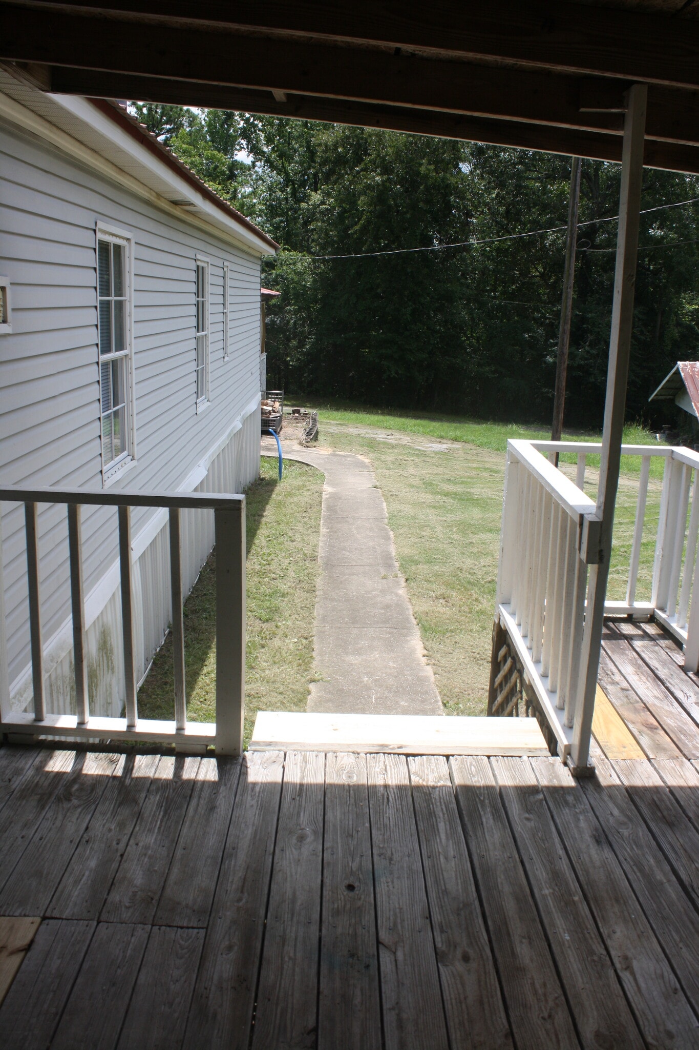 back porch leading to garage - 3305 Peaceway Dr