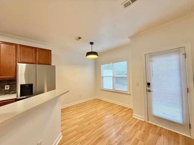 Building Photo - Modern 3BD, 2.5BA End Unit Raleigh Townhome with HOA Amenities Near I-540 & Triangle Town Center