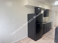 Building Photo - 2128 W Florence Ave