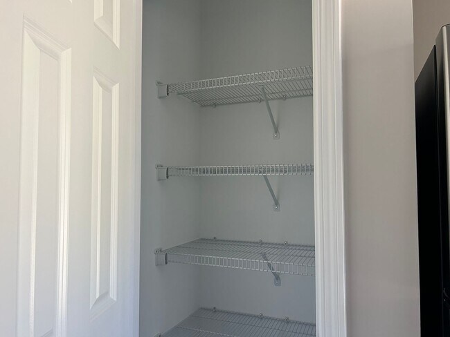 Building Photo - Three bedroom three bath available now!