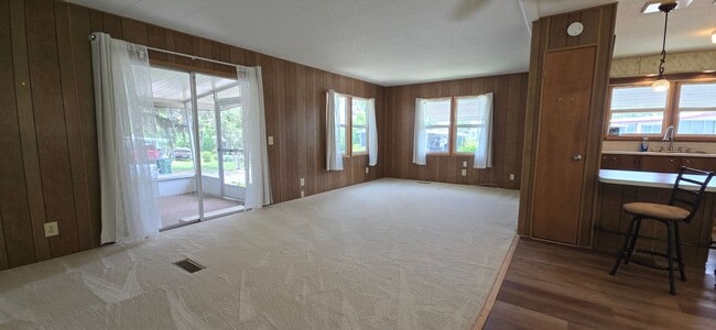Building Photo - 2 bed 2 baths with carport