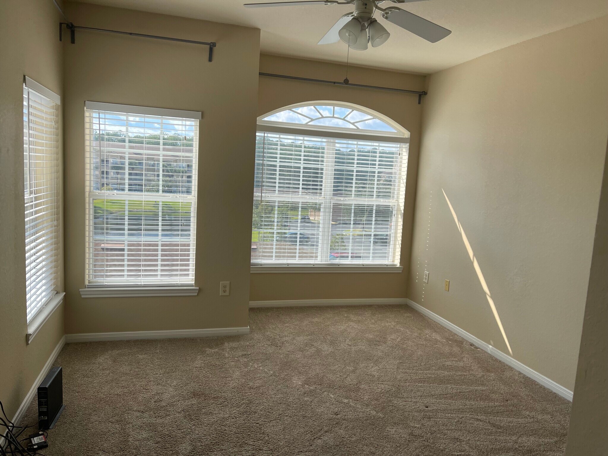 Bd 1 Large windows w view to the lake, and exit to terrace - 275 Old Village Center Cir