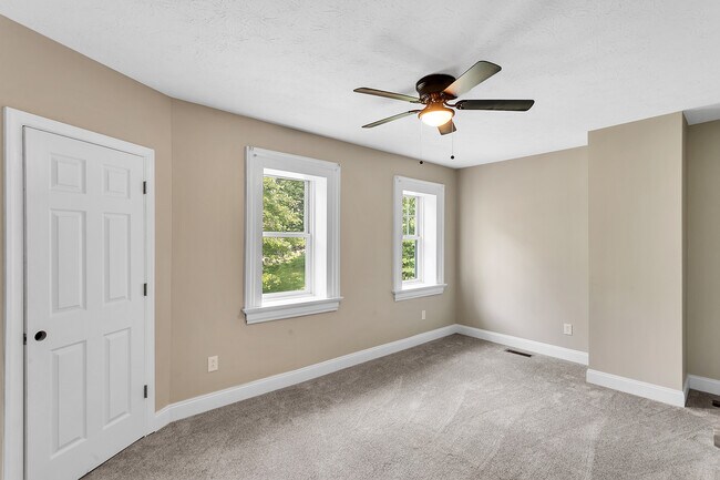 Bedroom #2 with brand new wall-to-wall carpeting - 2416 Magee Road Ext