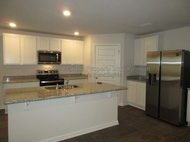 Building Photo - 5588 Lancelot Trl