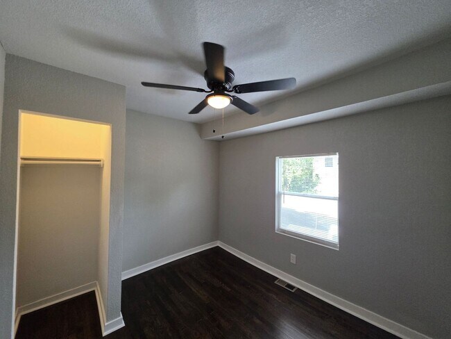 Building Photo - Spacious 4-Bedroom, 2.5-Bath Home with Hardwood Floors