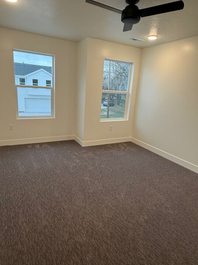 Building Photo - Half off first months rent - Beautiful townhome with 2 car garage, Central Air and Master Suite