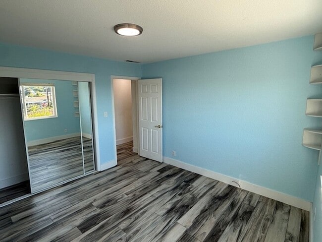 Building Photo - Remodeled 3 Bedroom Home with Bay Views + Stunning Backyard Patio