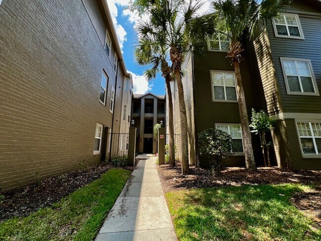 Building Photo - NEW-Remodeled bathroom & kitchen! NEW VINYL PLANK flooring & fresh paint! 2 bedroom 1 bath condo ...