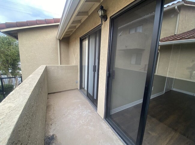 Building Photo - Updated condominium in a quiet gated commu...