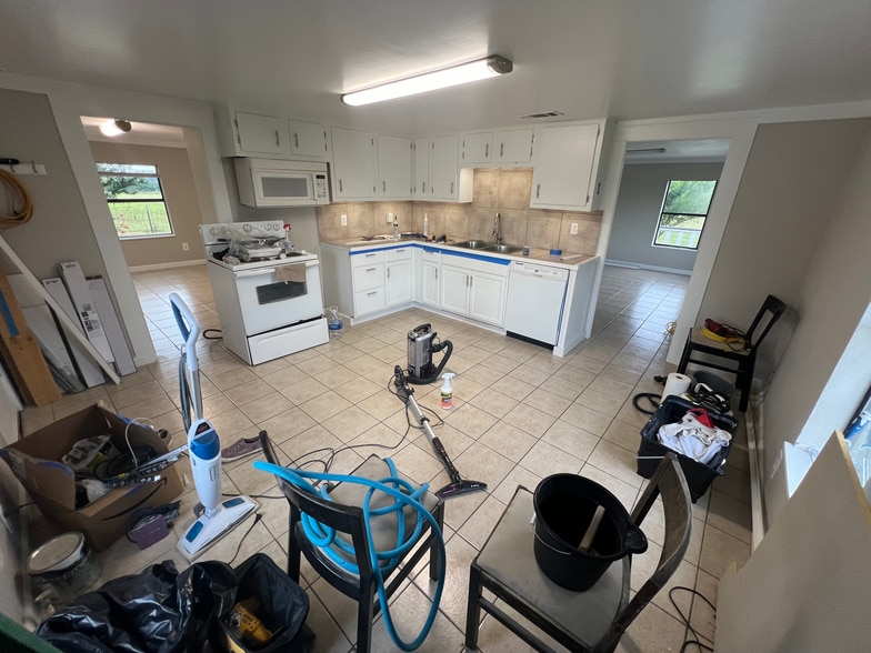 Widest view of kitchen durning remodeling - Left door to 2nd BDR and Right to Living Room - 2900 County Road 285