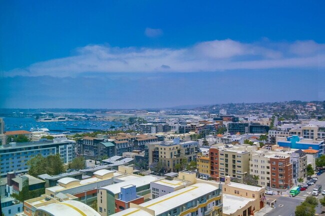 Building Photo - Penthouse Living in Charming Little Italy