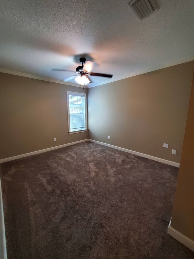 Building Photo - Spacious 4-Bedroom Home with Open Layout, Granite Finishes & Fenced Yard