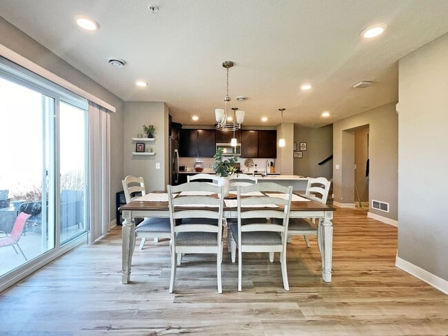 Building Photo - Spacious 2-Story End-Unit Townhome with Huge Bonus Room-Office is like Brand New!