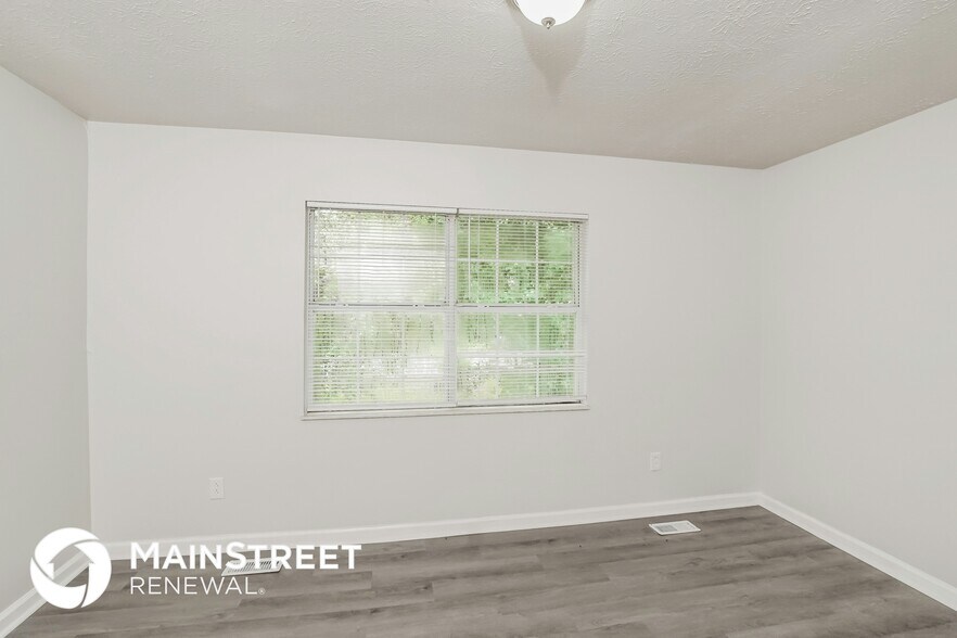 Building Photo - 5821 Whisper Wood Rd