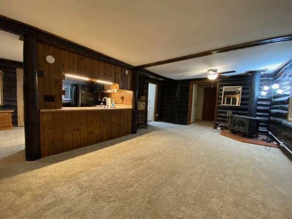 Open concept and wood burning stove - 4407 Outlook St