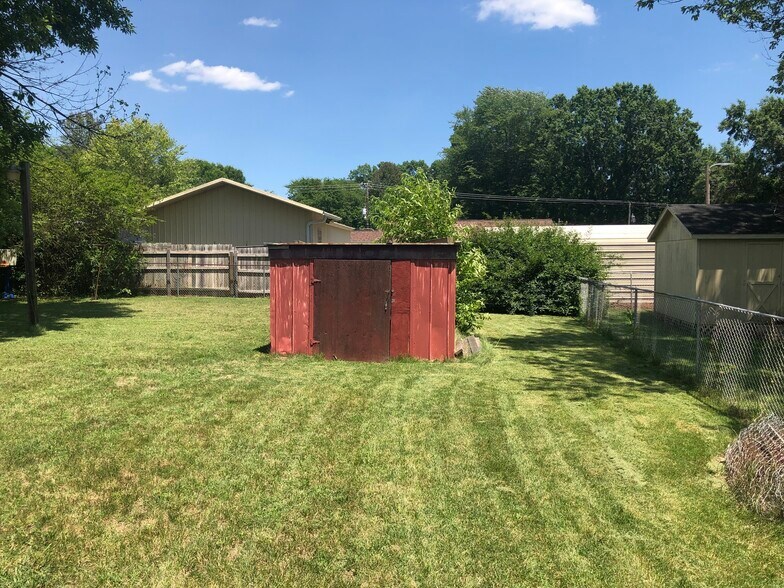 Mowed lawn backyard . Shed removed - 614 Roberts St
