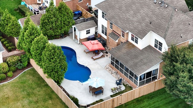 Building Photo - Beautiful brick home with a saltwater pool
