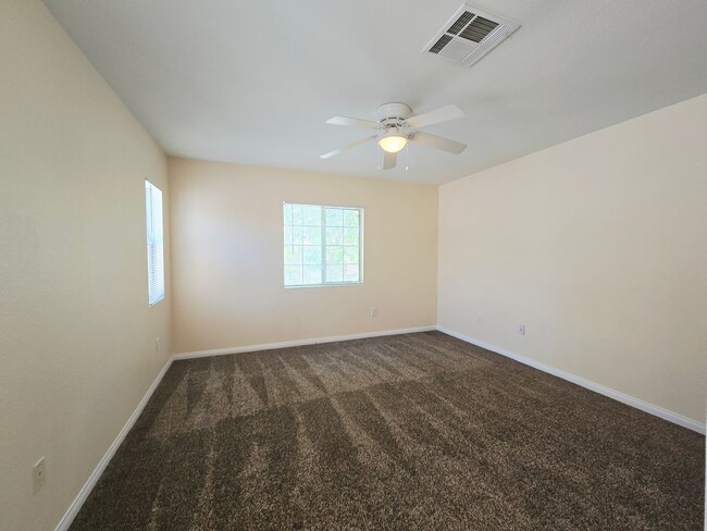 Building Photo - 8295 Golden Flowers St