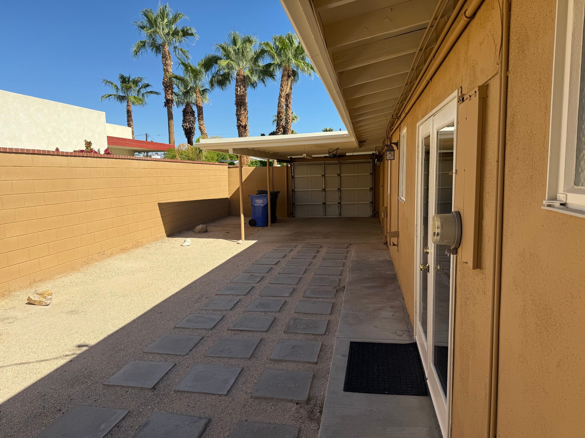 Backyard includes one covered parking space. Walled and gated. Great for dogs. - 1450 E Granvia Valmonte