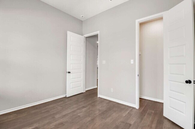Building Photo - "Spacious 4-Bedroom Sanctuary with Cozy Fireplace in San Antonio's Prime Location!"