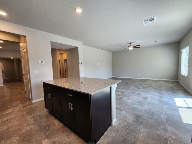 Building Photo - A Fairly New Home with 5 Bedrooms in a gated community