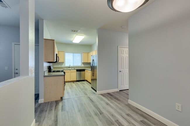 Building Photo - Spanish Palms a Guard Gated Community