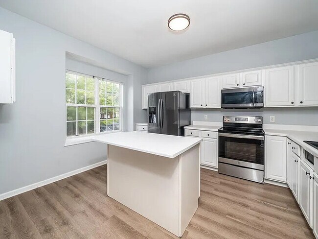 Building Photo - Earn Wealth While Leasing - Like a Homeown...