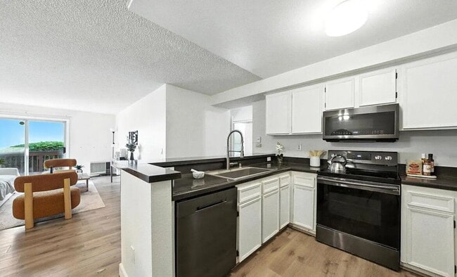 Building Photo - This 1-bedroom, 1-bathroom unit offers an ideal blend of comfort, convenience, and community