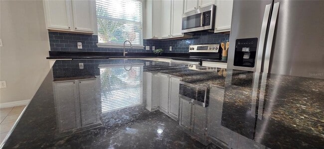 Building Photo - 9478 Silver Buttonwood St