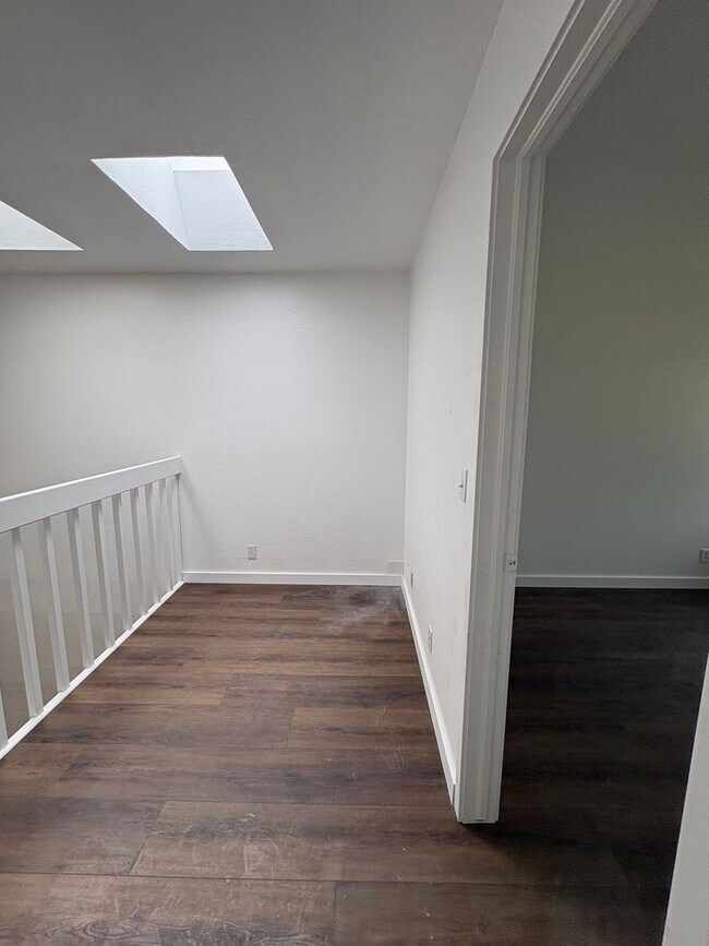 Building Photo - Completely Renovated 2 Bed 1.5 Bath West Pearl Street Condo W/Hiking Trails In Your Backyard.