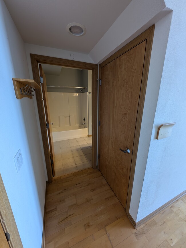 Front hall to the main floor bathroom - 2121 S Kinnickinnic Ave