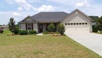 Building Photo - Modern Elegance Meets Spacious Comfort: 4B...