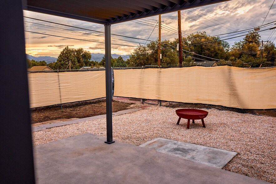 Xeriscaped backyard with area for tenants to garden - 1116 E Fountain Blvd