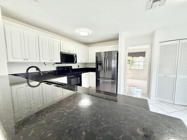 Building Photo - 10579 Pebble Cove Ln