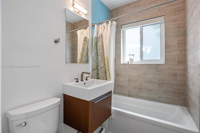 Building Photo - 9025 Dickens Ave