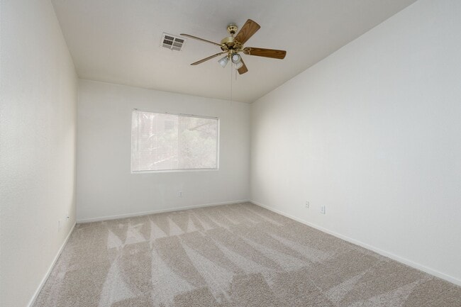 Building Photo - Refurbished upstairs two bedroom in well maintained East side gated complex